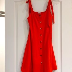 A beautiful orange Sew Luxie dress